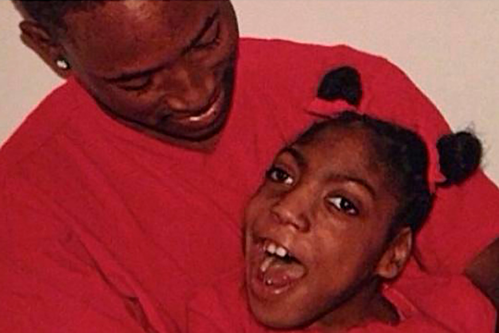 In this undated family photo provided by Erica Lattimore through Fieger Law shows her daughter, Timesha Beauchamp with her brother Steven Thompson in Southfield, Mich. Michigan authorities have agreed to reinstate the licenses of two suburban Detroit paramedics if they pass a national exam, after Timesha Beauchamp declared dead on their watch was discovered to be alive at a funeral home. Beauchamp was declared dead only to be found alive at a funeral home in August 2020. Beauchamp died on Oct. 18, 2020 at Children's Hospital in Detroit. (Courtesy Erica Lattimore through Fieger Law via AP)