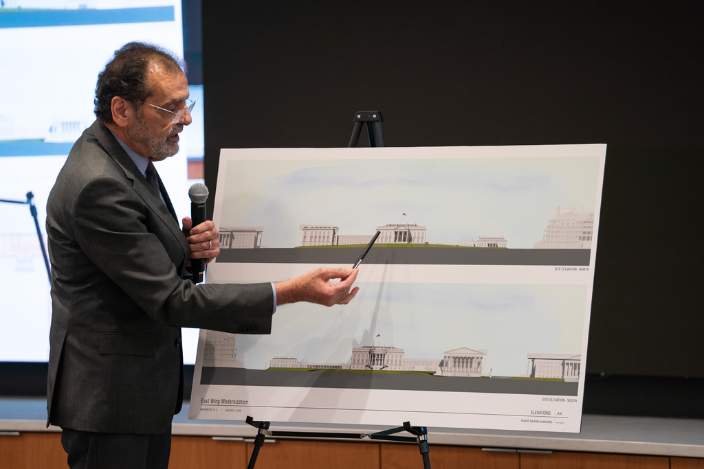 Architect Shalom Baranes points at a rendering on a board during a National Capitol Planning Commission meeting discussing the White House ballroom project, Thursday, Jan. 8, 2026, in Washington. (AP Photo/Allison Robbert)