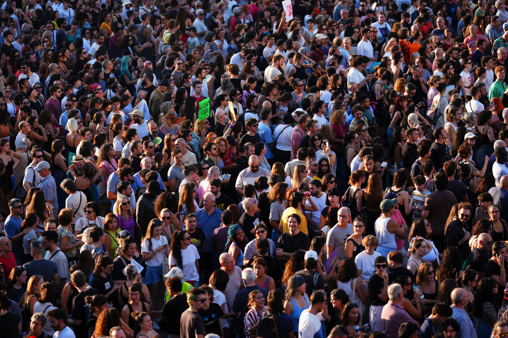 People gather during a protest following the eviction last Wednesday of 87-year-old Maricarmen to demand stronger laws to protect renters at Puerta del Sol in Madrid, Spain, Saturday, Sept. 26, 2026. (AP Photo/Manu Fernandez)