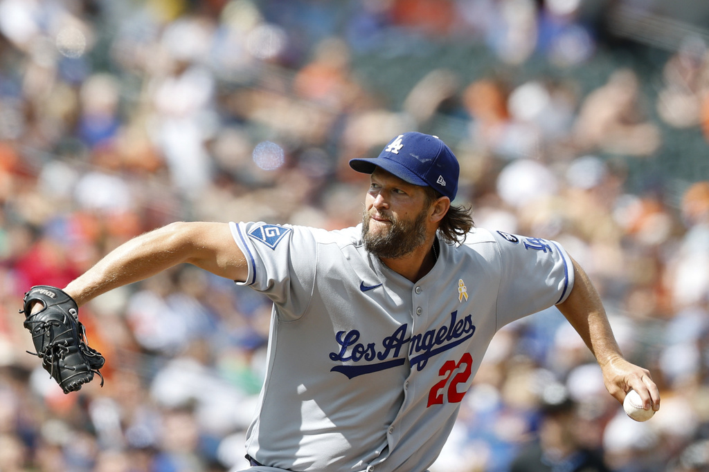 Los Angeles Dodgers pitcher Clayton Kershaw throws during the second inning of a baseball game against the Baltimore Orioles, Sunday, Sept. 7, 2025, in Baltimore. (AP Photo/Terrance Williams)
