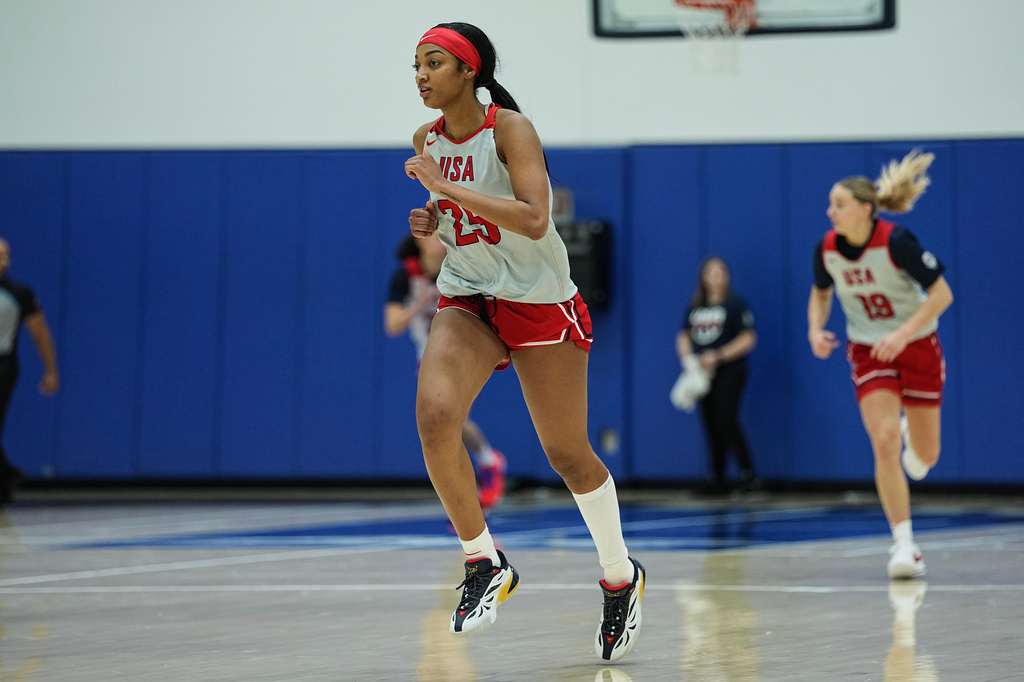 FILE - Angel Reese (25) runs upcourt during a training camp for the U.S women's national basketball team Dec. 12, 2025, in Durham, N.C. (AP Photo/Matt Kelley, File)