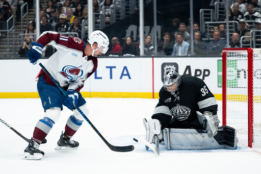 Los Angeles Kings goaltender Darcy Kuemper (35) blocks the shot by Colorado Avalanche center Brock Nelson during the first period of an NHL hockey game, Tuesday, Oct. 7, 2025, in Los Angeles. (AP Photo/Kyusung Gong) Los Angeles Kings goaltender Darcy Kuemper (35) blocks the shot by Colorado Avalanche center Brock Nelson during the first period of an NHL hockey game, Tuesday, Oct. 7, 2025, in Los Angeles. (AP Photo/Kyusung Gong)
