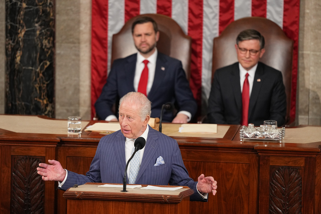 Britain's King Charles III speaks to a joint meeting of Congress in the House Chamber at the U.S. Capitol, Tuesday, April 28, 2026, in Washington, as Vice President JD Vance and House Speaker Mike Johnson of La., listen. (AP Photo/Matt Rourke)