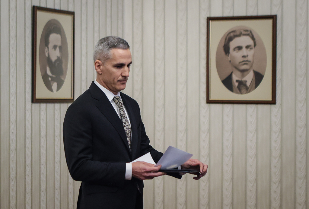 Andrey Gyurov, the prime minister–designate presents the list of his caretaker government at Bulgarian presidency office in Sofia, Bulgaria, Wednesday, Feb. 18, 2026. (AP Photo/Valentina Petrova)