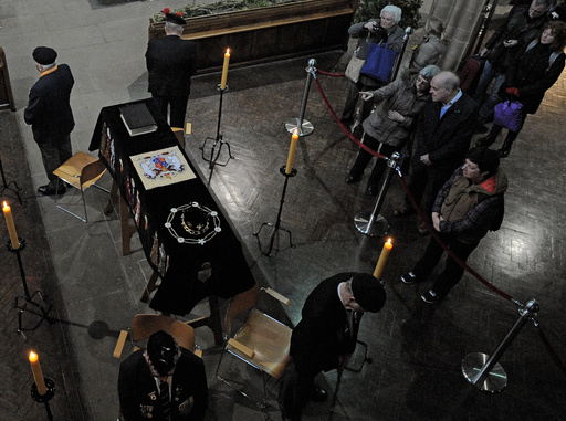 FILE - In this Monday, March 23, 2015 file photo, members of the public view the coffin of Richard III as it lies in repose inside Leicester Cathedral, Leicester, England. (AP Photo/Rui Vieira, File) FILE - In this Monday, March 23, 2015 file photo, members of the public view the coffin of Richard III as it lies in repose inside Leicester Cathedral, Leicester, England. (AP Photo/Rui Vieira, File)