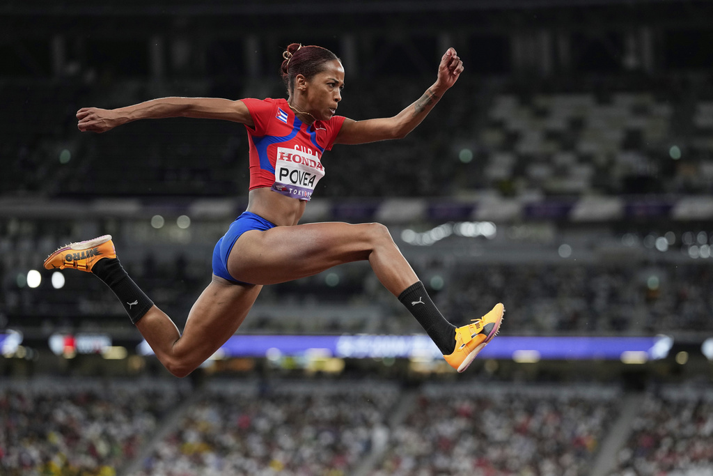 Cuba's Liadagmis Povea makes an attempt in the women's triple jump final at the World Athletics Championships in Tokyo, Thursday, Sept. 18, 2025. (AP Photo/Matthias Schrader)