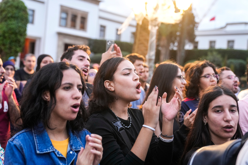 People take part in a youth-led protest against corruption and calling for education and healthcare reforms, in Rabat, Morocco, Thursday, Oct. 9, 2025. (AP Photo/Mosa'ab Elshamy)