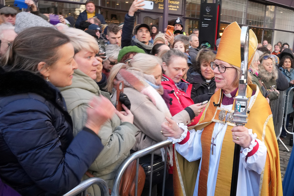 Sarah Mullally speaks to members of the public after the Enthronement Ceremony installing her as archbishop of Canterbury in Canterbury, England, Wednesday, March 25, 2026, the first woman ever to lead the Church of England. (AP Photo/Alastair Grant)