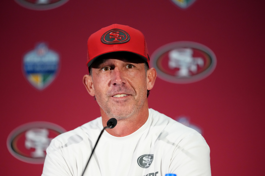 San Francisco 49ers head coach Kyle Shanahan speaks during a news conference after an NFL football game against the Los Angeles Rams, Friday, Sept. 11, 2026, in Melbourne, Australia. (AP Photo/Scott Barbour)
