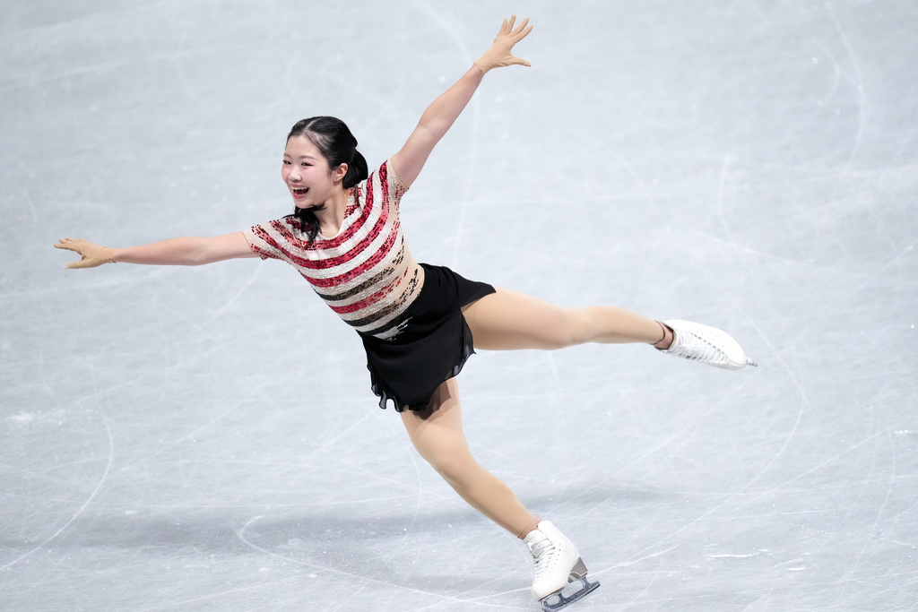 Ami Nakai, of Japan, competes in the women's short program segment at the ISU Grand Prix of Figure Skating Final in Nagoya, central Japan, Friday, Dec. 5, 2025. (AP Photo/Hiro Komae)