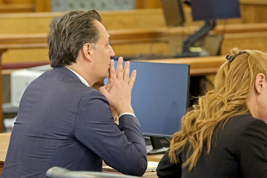 Defendant Brian Walshe, left, listens during his murder trial, Friday, Dec. 12, 2025, in Dedham, Mass. (Stuart Cahill/The Boston Herald via AP, Pool)