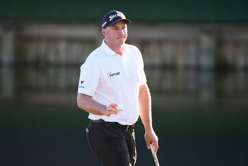 Sepp Straka of Austria reacts after finished his round during the first round of The Players Championship golf tournament Thursday, March 12, 2026, in Ponte Bedra Beach, Fla. (AP Photo/Gerald Herbert)
