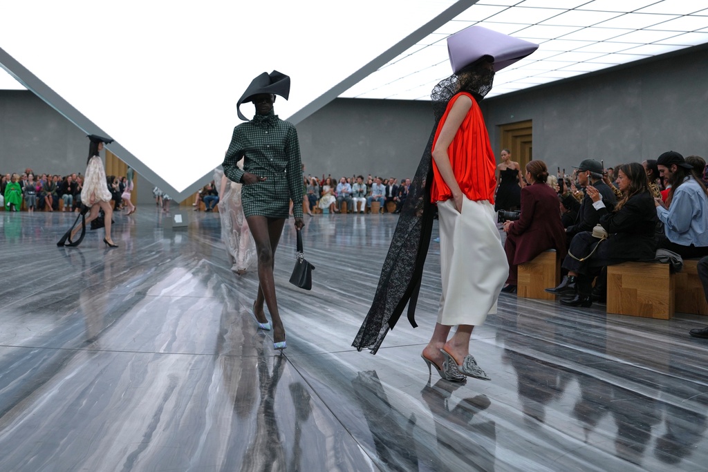Models wear creations as part of the Dior Spring/Summer 2026 collection presented in Paris, Wednesday, Oct. 1, 2025. (AP Photo/Aurelien Morissard)