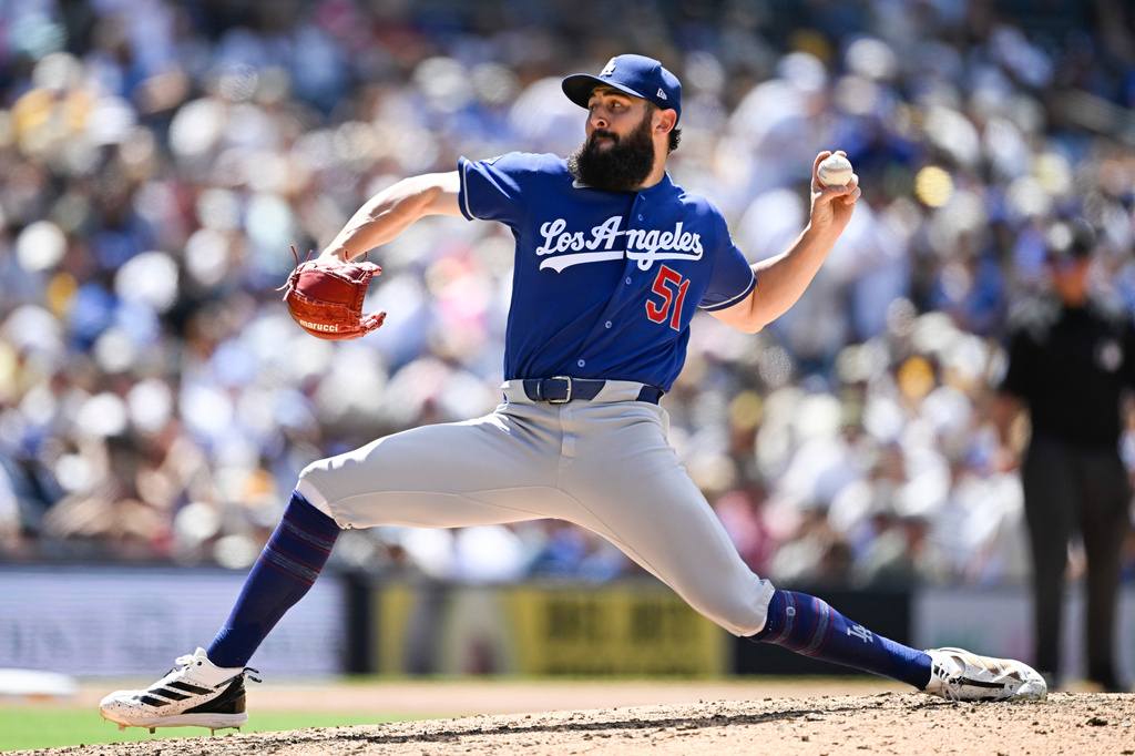 Los Angeles Dodgers pitcher Alex Vesia delivers during the sixth inning of a baseball game against the San Diego Padres, Sunday, June 28, 2026, in San Diego. (AP Photo/Denis Poroy)