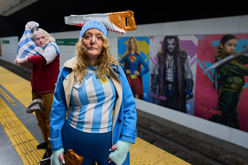 Judith Naidorf, a researcher with Argentina's National Scientific and Technical Research Council, poses for a photo while waiting to ride the subway to a protest demanding increased funding for science in Buenos Aires, Argentina, Wednesday, Aug. 12, 2026. (AP Photo/Rodrigo Abd)