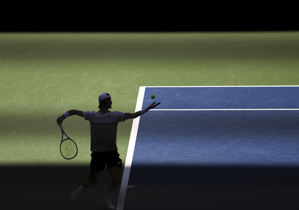 Lloyd Harris, of South Africa, serves to Taylor Fritz, of the United States, during the second round of the U.S. Open tennis championships, Wednesday, Aug. 27, 2025, in New York. (AP Photo/Andres Kudacki)