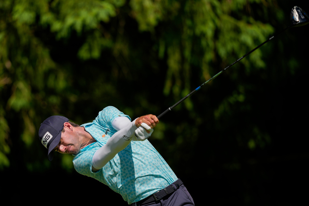 Alex Smalley hits from the fourth tee during the third round of the PGA Championship golf tournament at Aronimink Golf Club, Saturday, May 16, 2026, in Newtown Square, PA. (AP Photo/Carolyn Kaster)