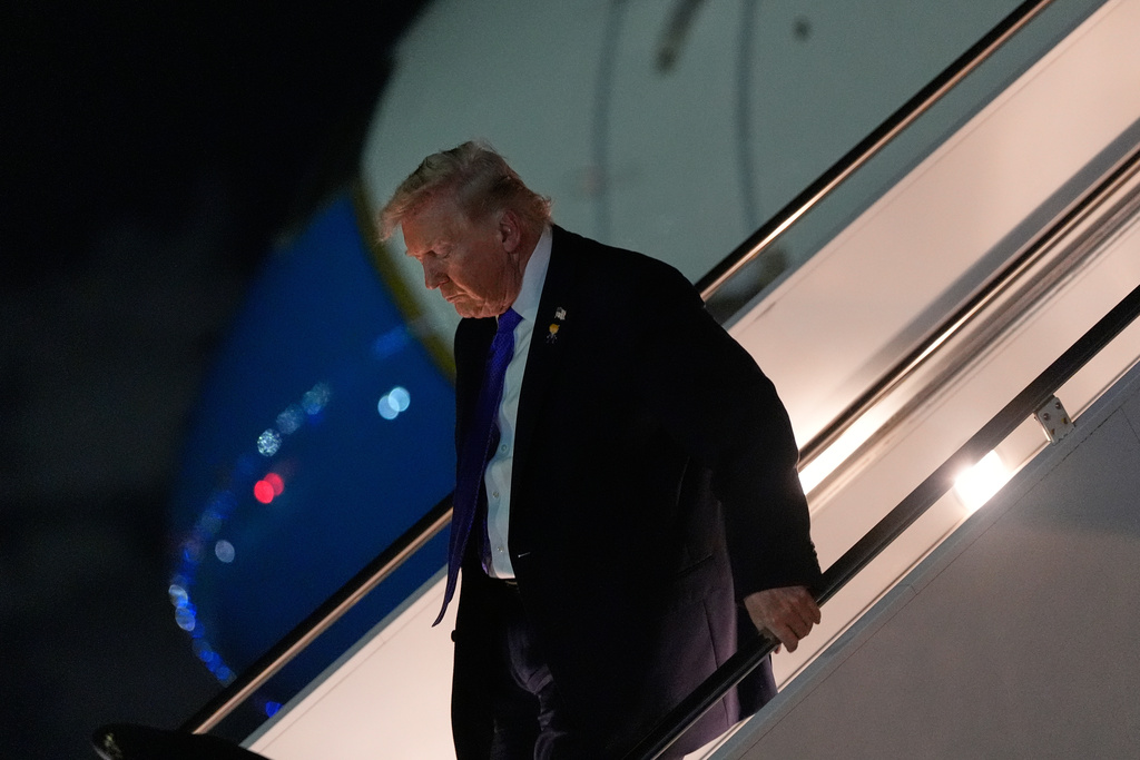 President Donald Trump arrives on Air Force One at Palm Beach International Airport, Friday, Jan. 9, 2025, in West Palm Beach, Fla. (AP Photo/Julia Demaree Nikhinson)