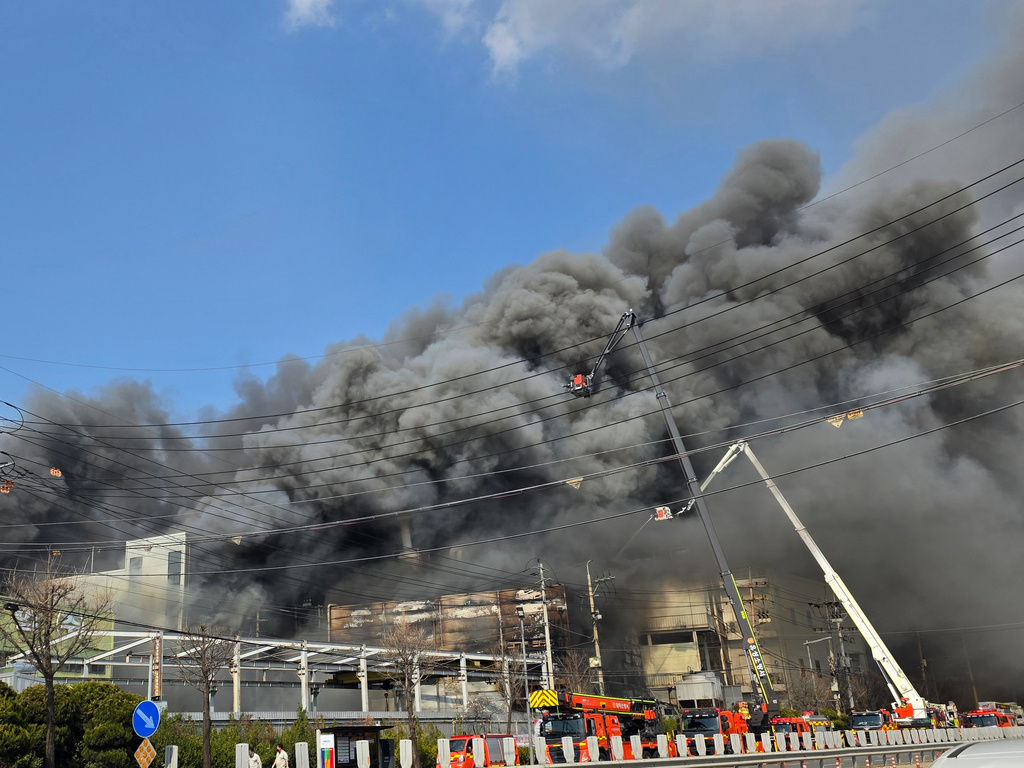 Black smoke rises from an auto parts plant in Daejeon, South Korea, Friday, March 20, 2026. (Kim So-yeon/Yonhap via AP)