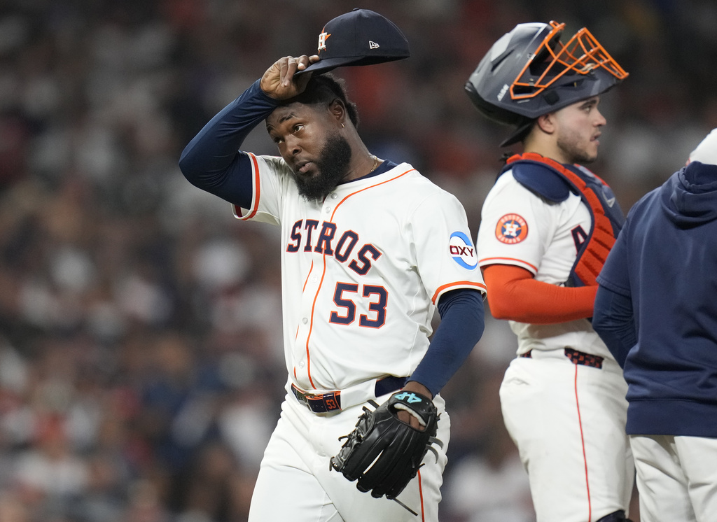 Houston Astros starting pitcher Cristian Javier (53) reacts after getting pulled by manager Joe Espada after New York Yankees' Cody Bellinger's RBI single during the fifth inning of a baseball game Thursday, Sept. 4, 2025, in Houston. (AP Photo/Karen Warren)