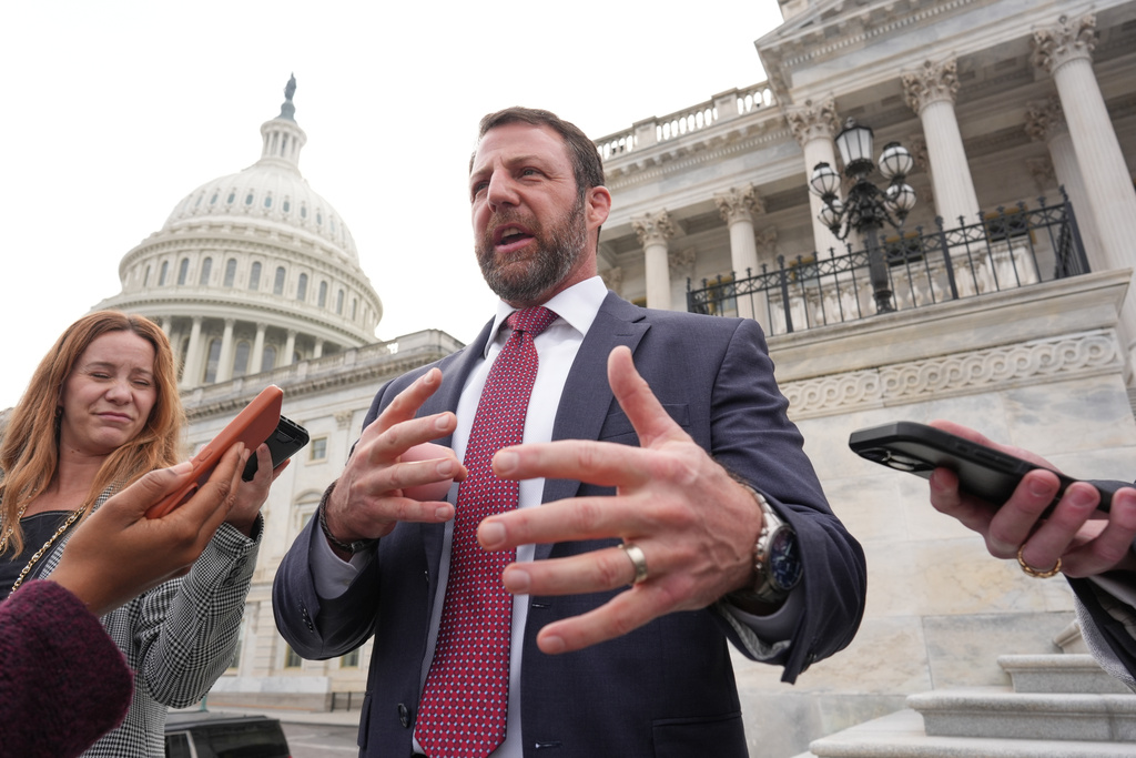 Sen. Markwayne Mullin, R-Okla., speaks to reporters at the Capitol in Washington, Thursday, March 5, 2026. (AP Photo/J. Scott Applewhite)