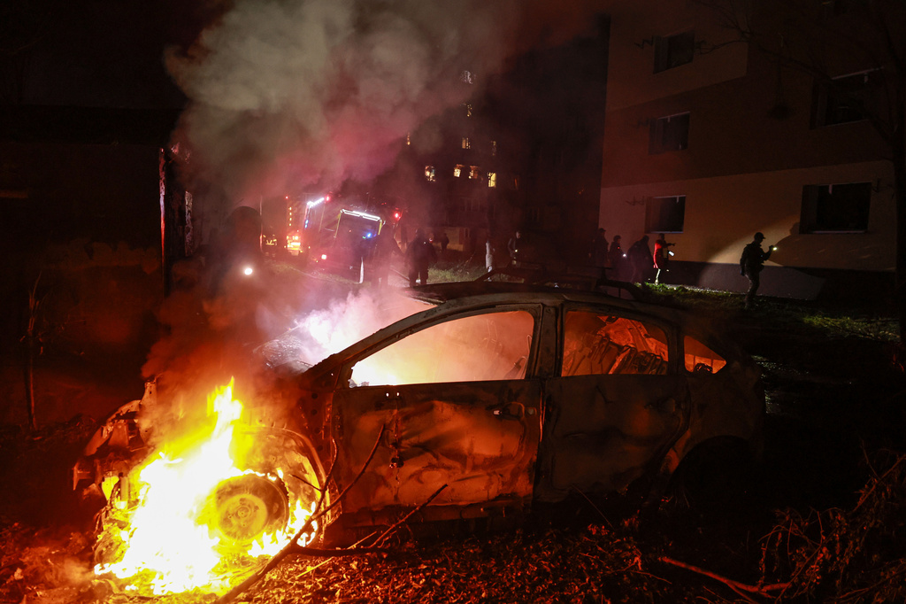 A car burns after a Russian airstrike on a residential neighborhood in Zaporizhzhia, Ukraine, Saturday, Oct. 17, 2026. (AP Photo/Kateryna Klochko)