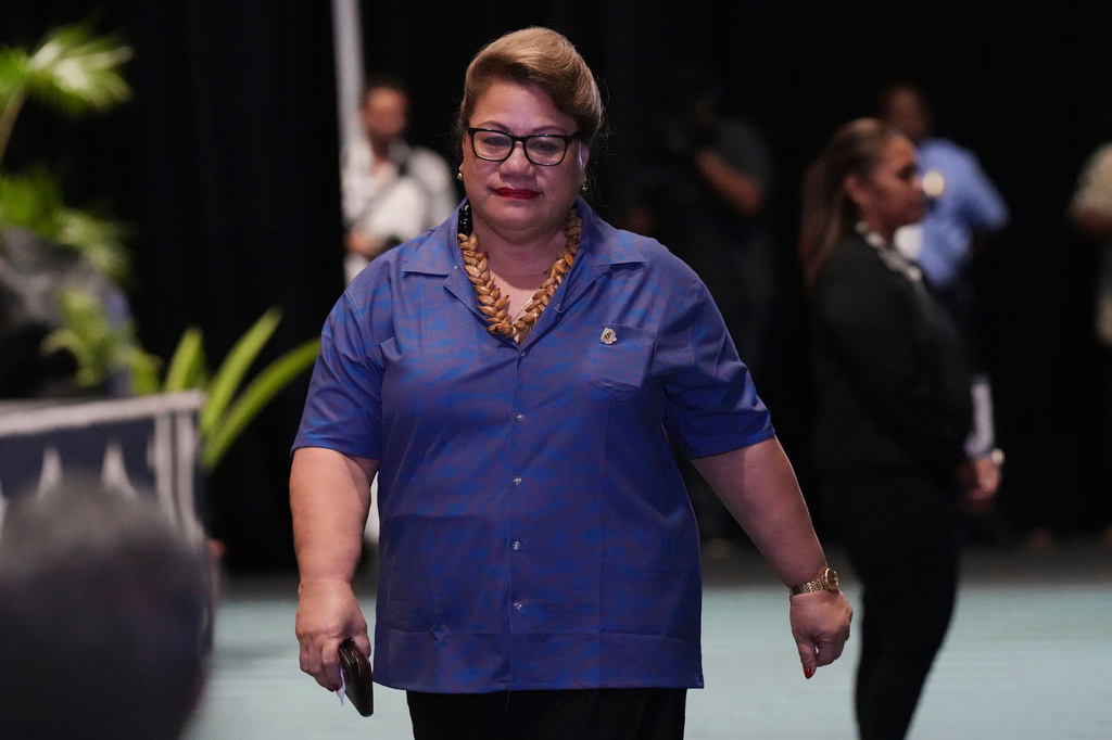 Samoa's Deputy Prime Minister Mulipola Anarosa 'Ale Molio'o walks to her seat during the opening ceremony at the Pacific Islands Forum Leaders Meeting in Koror, Palau, Monday, Aug. 31, 2026. (AP Photo/Charlotte Graham-McLay)