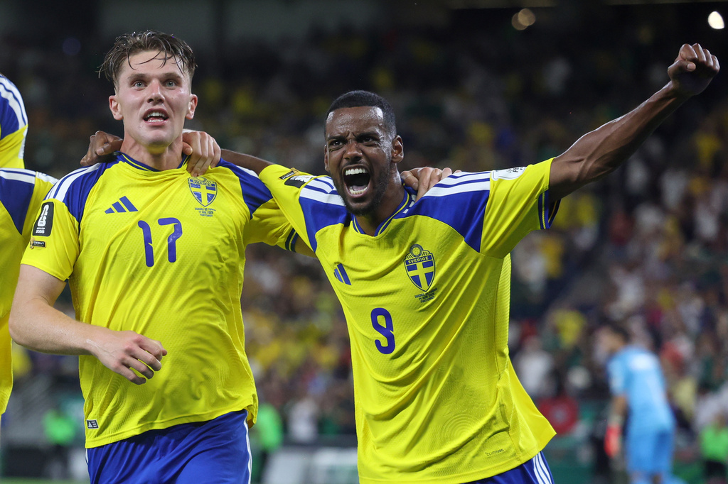 Sweden's Alexander Isak (9) celebrates with Sweden's Viktor Gyokeres (17) after he scored to put Sweden up, 3-1, during the World Cup Group F soccer match between Sweden and Tunisia in Guadalupe, near Monterrey, Mexico, Sunday, June 14, 2026. (AP Photo/Sofia Yaker)