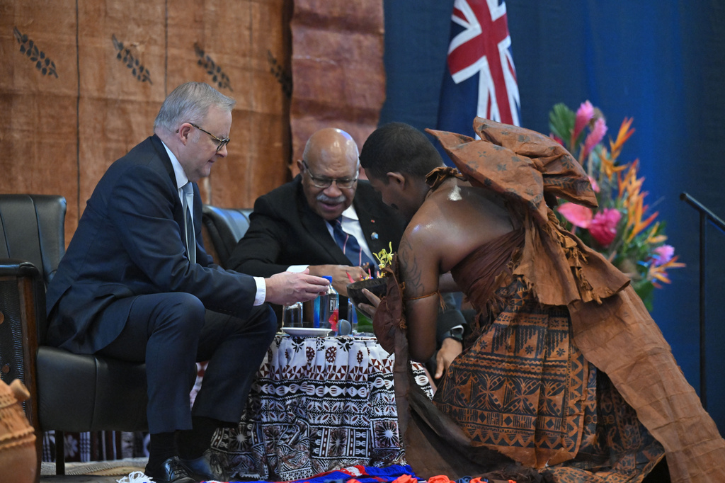 Australia's Prime Minister Anthony Albanese, left, and Fiji's Prime Minister Sitiveni Rabuka are offered kava, a traditional Fijian drink, during welcome a ceremony in Suva, Fiji, Monday, July 6, 2026. (Mick Tsikas/AAP Image via AP)