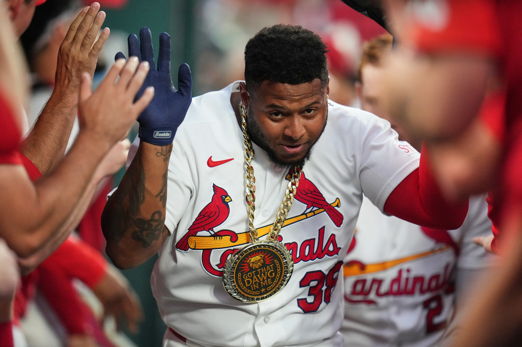 St. Louis Cardinals' Nelson Velázquez is congratulated by teammates after hitting a two-run home run during the sixth inning in the second game of a baseball doubleheader against the Milwaukee Brewers Tuesday, July 7, 2026, in St. Louis. (AP Photo/Jeff Roberson)