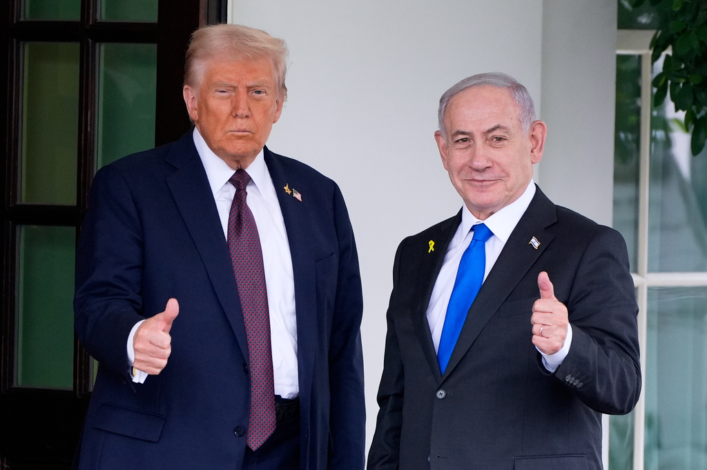 FILE - President Donald Trump greets Israeli Prime Minister Benjamin Netanyahu at the West Wing of the White House, Monday, Sept. 29, 2025, in Washington. (AP Photo/Alex Brandon, file)