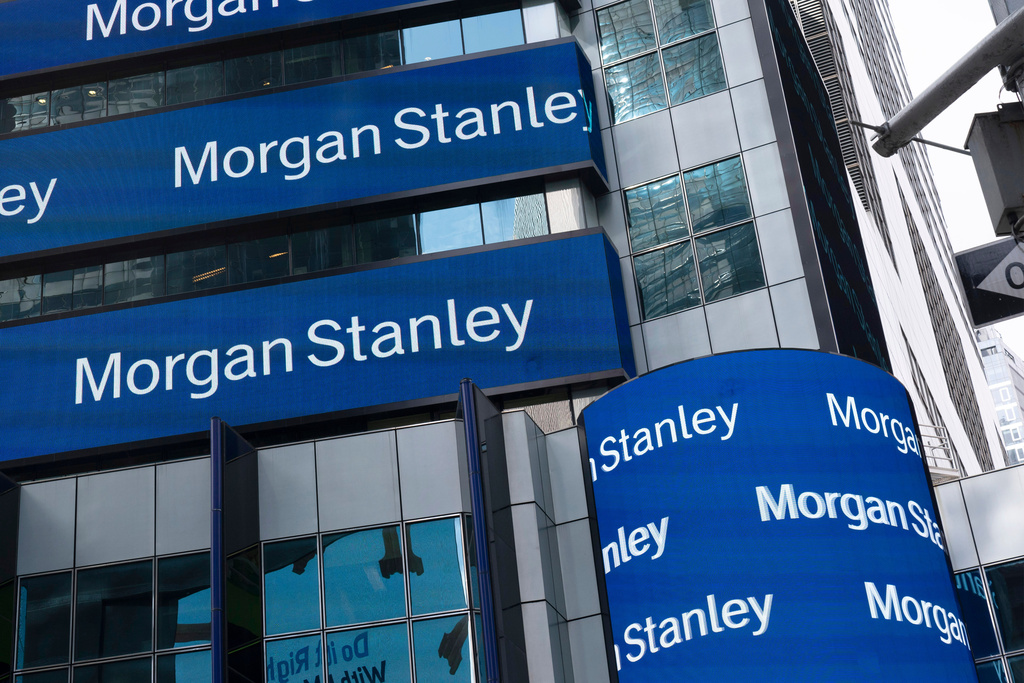 FILE - Electronic signage is shown at Morgan Stanley headquarters, Thursday, March 4, 2021 in New York. (AP Photo/Mark Lennihan, File)