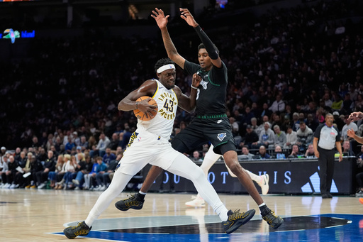 Indiana Pacers forward Pascal Siakam (43) works toward the basket as Minnesota Timberwolves forward Jaden McDaniels, right, defends during the first half of an NBA basketball game, Sunday, Oct. 26, 2025, in Minneapolis. (AP Photo/Abbie Parr) Indiana Pacers forward Pascal Siakam (43) works toward the basket as Minnesota Timberwolves forward Jaden McDaniels, right, defends during the first half of an NBA basketball game, Sunday, Oct. 26, 2025, in Minneapolis. (AP Photo/Abbie Parr)