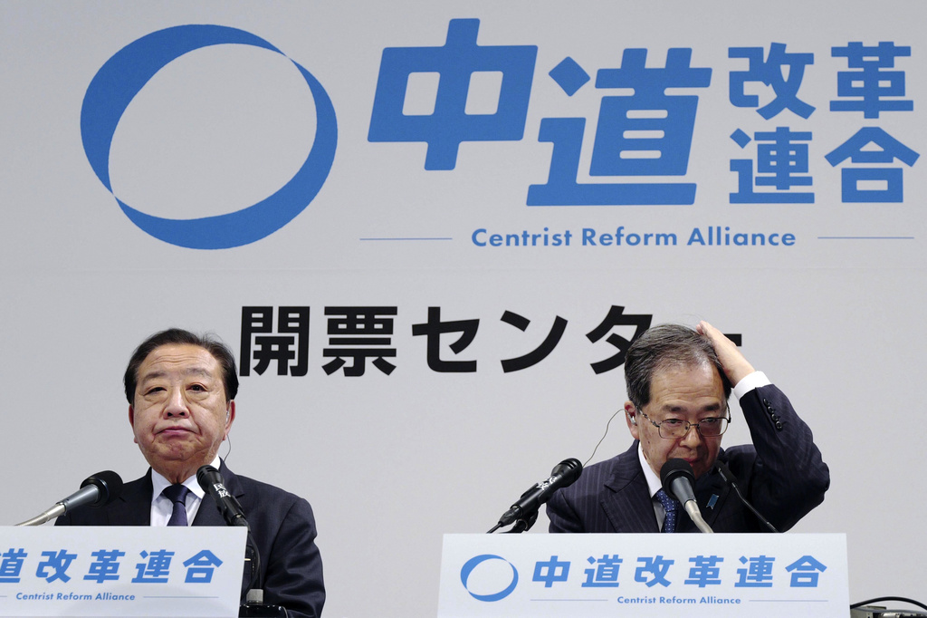 CORRECTS FIRST NAME OF SAITO - Yoshihiko Noda, left, and Tetsuo Saito, right, co-heads of the newly formed Japanese political party Centrist Reform Alliance, attend their press conference Sunday, Feb. 8, 2026 in Tokyo, (Yohei Fukai/Kyodo News via AP)