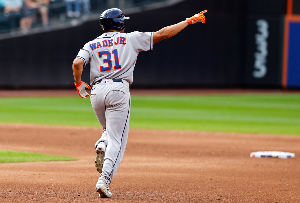 Houston Astros' LaMonte Wade Jr. runs the bases after hitting a home run against the New York Mets during the sixth inning of a baseball game, Sunday, Aug. 30, 2026, in New York. (AP Photo/Noah K. Murray)