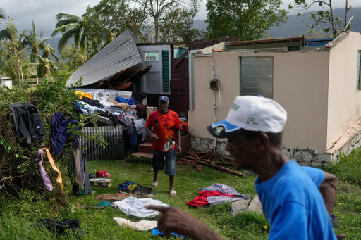 Residents dry belongings at a house damaged by Hurricane Melissa in Santa Cruz, Jamaica, Wednesday, Oct. 29, 2025.(AP Photo/Matias Delacroix) Residents dry belongings at a house damaged by Hurricane Melissa in Santa Cruz, Jamaica, Wednesday, Oct. 29, 2025.(AP Photo/Matias Delacroix)
