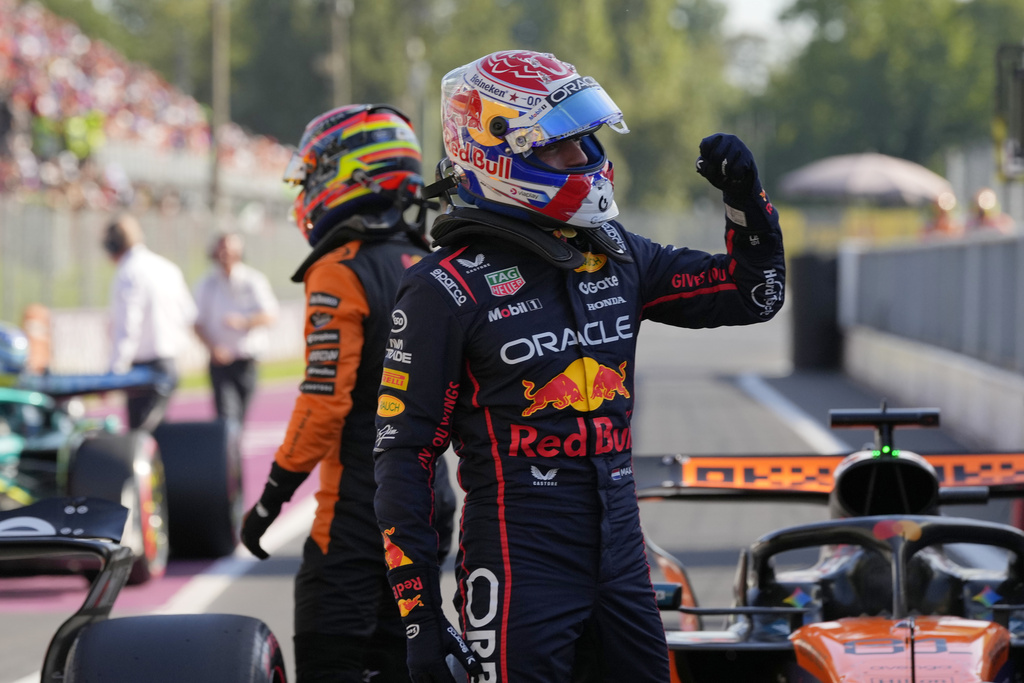 Red Bull driver Max Verstappen of the Netherlands celebrates his pole position after the qualifying session ahead of the Italian Grand Prix at the Monza racetrack in Monza, Italy, Saturday, Sept. 6, 2025. (AP Photo/Luca Bruno)