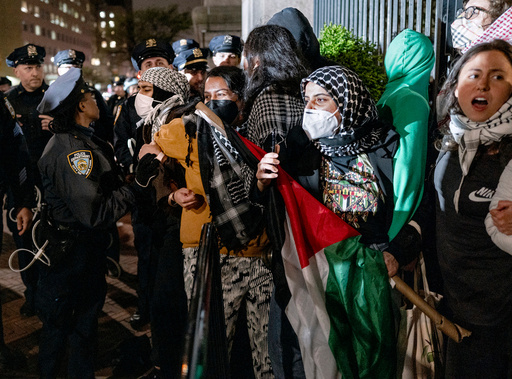 FILE - Leqaa Kordia, second from right, demonstrates with pro-Palestianian protesters as they gather near a main gate at Columbia University in New York, Tuesday, April 30, 2024, just before New York City police officers cleared the area after a building was taken over by protesters earlier in the day. (AP Photo/Craig Ruttle, File) FILE - Leqaa Kordia, second from right, demonstrates with pro-Palestianian protesters as they gather near a main gate at Columbia University in New York, Tuesday, April 30, 2024, just before New York City police officers cleared the area after a building was taken over by protesters earlier in the day. (AP Photo/Craig Ruttle, File)