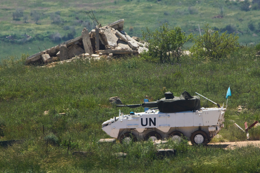 U.N. peacekeepers operate in southern Lebanon, as seen from northern Israel, Wednesday, April 29, 2026. (AP Photo/Ariel Schalit)