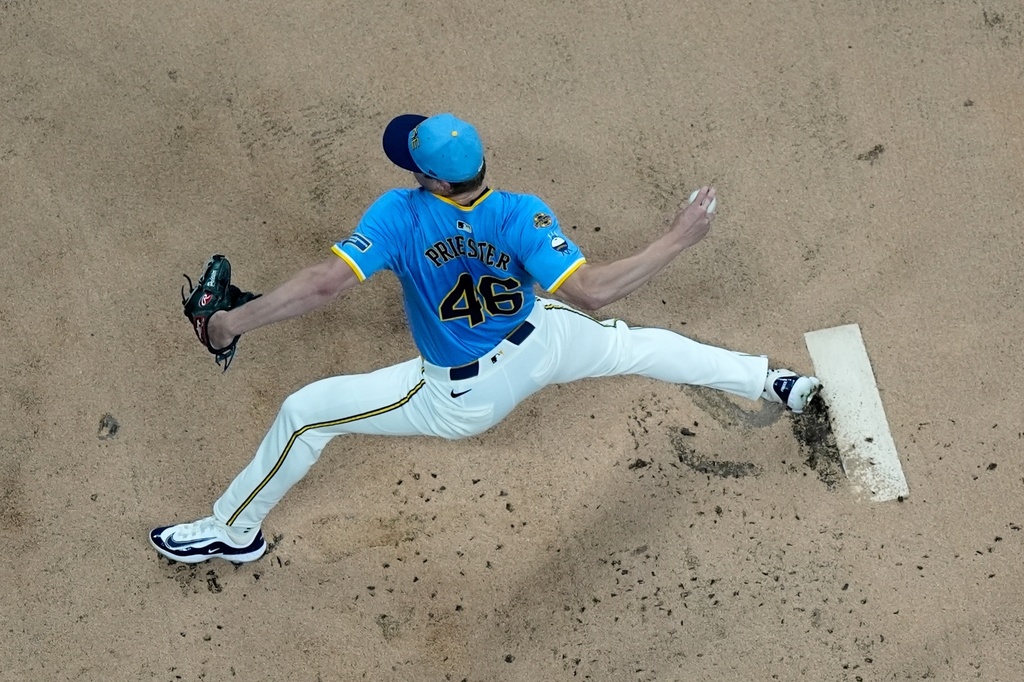 Milwaukee Brewers' Quinn Priester throws during the first inning of a baseball game against the Cincinnati Reds Friday, Sept. 26, 2025, in Milwaukee. (AP Photo/Morry Gash)