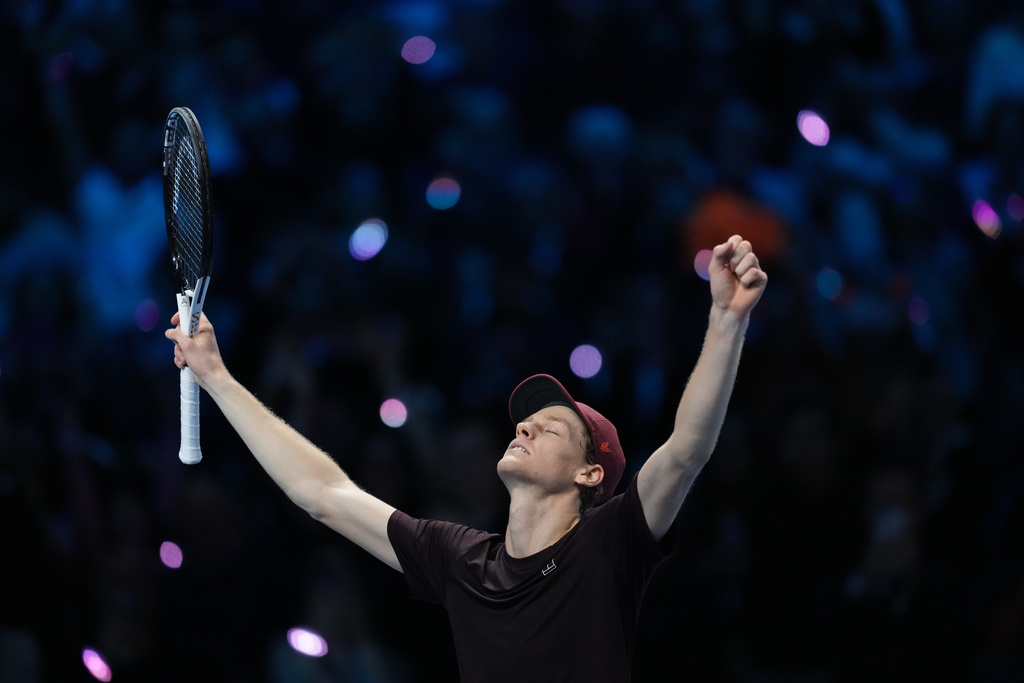 Italy's Jannik Sinner reacts after winning the final tennis match of the ATP World Tour Finals against Spain's Carlos Alcaraz in Turin, Italy, Sunday, Nov. 16, 2025. (AP Photo/Antonio Calanni)