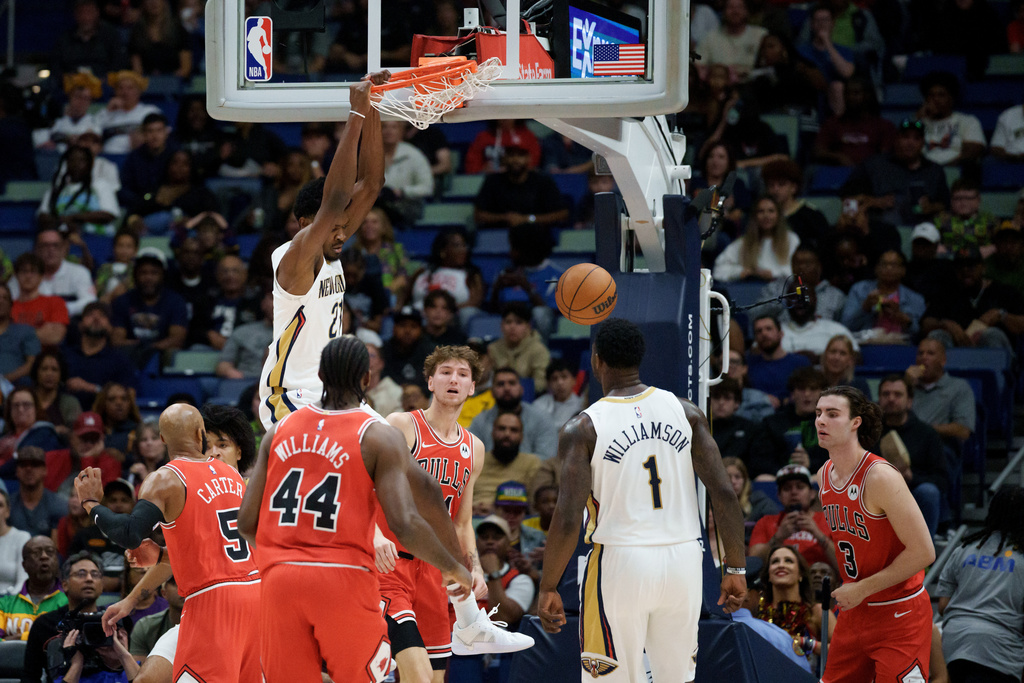 New Orleans Pelicans center Yves Missi dunks against the Chicago Bulls during the first half of an NBA basketball game in New Orleans, Monday, Nov. 24, 2025. (AP Photo/Matthew Hinton)
