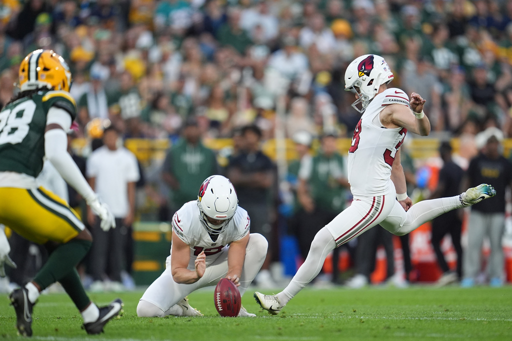 Arizona Cardinals place kicker Chad Ryland kicks a field goal during the first half of a preseason NFL football game against the Green Bay Packers Friday, Aug. 28, 2026, in Green Bay, Wis. (AP Photo/Abbie Parr)