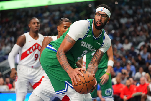 Dallas Mavericks forward Anthony Davis controls the ball during the first half of an NBA basketball game against the Toronto Raptors in Dallas, Sunday, Oct. 26, 2025. (AP Photo/LM Otero) Dallas Mavericks forward Anthony Davis controls the ball during the first half of an NBA basketball game against the Toronto Raptors in Dallas, Sunday, Oct. 26, 2025. (AP Photo/LM Otero)