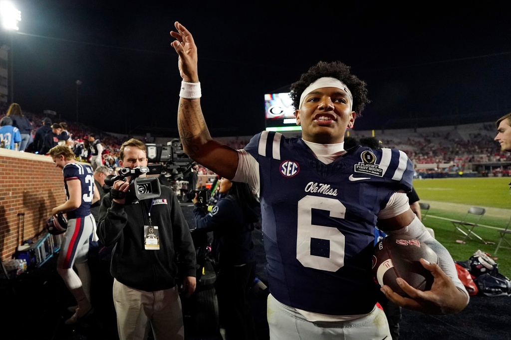 Mississippi quarterback Trinidad Chambliss (6) celebrates after his team defeated Tulane in the first round of the NCAA College Football Playoff, Saturday, Dec. 20, 2025, in Oxford, Miss. (AP Photo/Rogelio V. Solis)