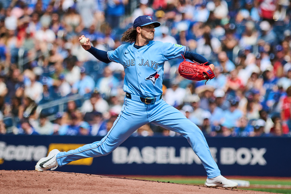 Toronto Blue Jays' Kevin Gausman (34) works against the St. Louis Cardinals during the first inning of a baseball game in Toronto, Saturday, Aug. 1, 2026. (Sammy Kogan/The Canadian Press via AP)