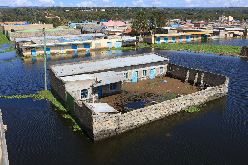 Residential buildings are submerged after Lake Naivasha swelled and flooded homes, displacing hundreds in Kihoto Village, in Naivasha, Kenya's Rift Valley region, Tuesday, Nov. 11, 2025. (AP Photo/Andrew Kasuku)