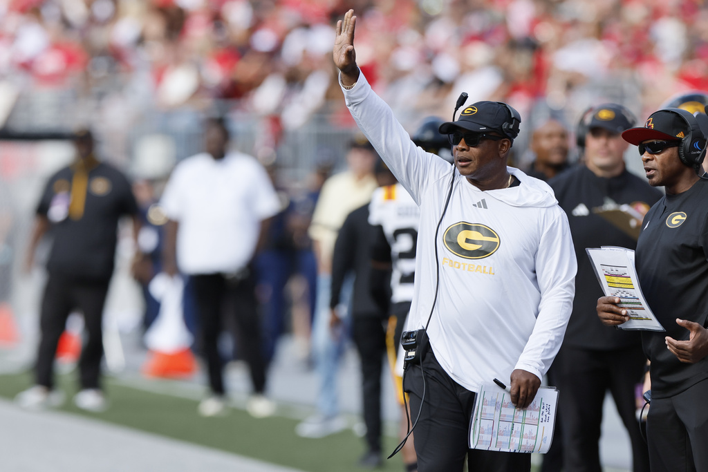 Grambling State head coach Mickey Joseph signals to his team against Ohio State during the first half of an NCAA college football game, Saturday, Sept. 6, 2025, in Columbus, Ohio. (AP Photo/Jay LaPrete)