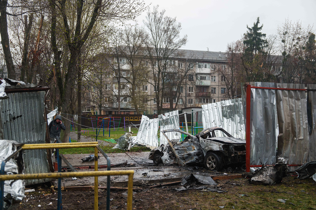 A destroyed car is seen after a Russian strike on residential neighbourhood in Vyshneve, Kyiv region, Ukraine, on Friday, April 3, 2026. (AP Photo/Evgeniy Maloletka)