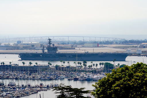 FILE - The USS Nimitz (CVN 68) departs San Diego Bay, Aug. 19, 2023, at Mission Beach, in San Diego. (Nelvin C. Cepeda/The San Diego Union-Tribune via AP, File) FILE - The USS Nimitz (CVN 68) departs San Diego Bay, Aug. 19, 2023, at Mission Beach, in San Diego. (Nelvin C. Cepeda/The San Diego Union-Tribune via AP, File)